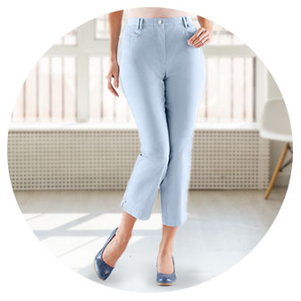 Woman wearing the Pocket Detail Capri Pants in the light blue color.