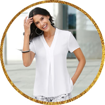 Woman wearing a white v-neck blouse.