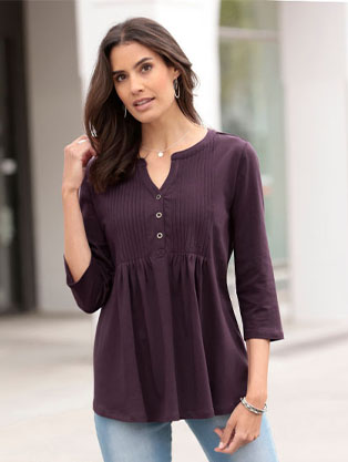Woman wearing the Aubergine Pleated Button Panel Top.