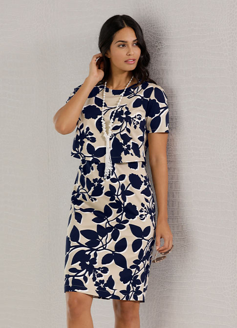 Women wearing the sand-navy blue-printed layered floral print dress.